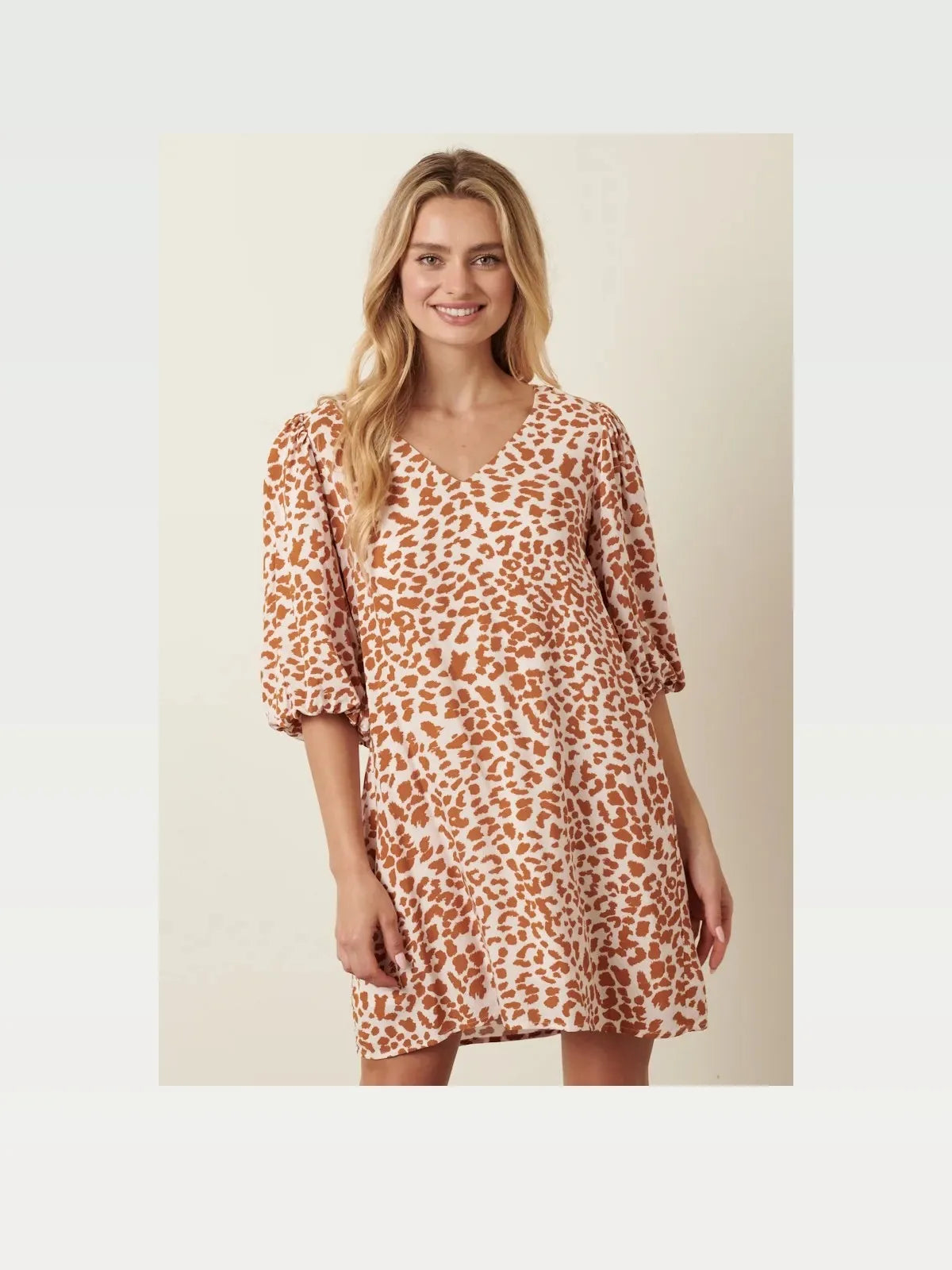 Animal Print Puff Sleeve Mini Dress in Mustard — styled showcase — Livostyle