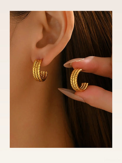 18K Gold-Plated Textured Triple Band Hoop Earrings — styled showcase — Livostyle