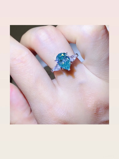 2 Carat 925 Sterling Silver Moissanite Ring — Pear-Shape Blu — styled showcase — Livostyle