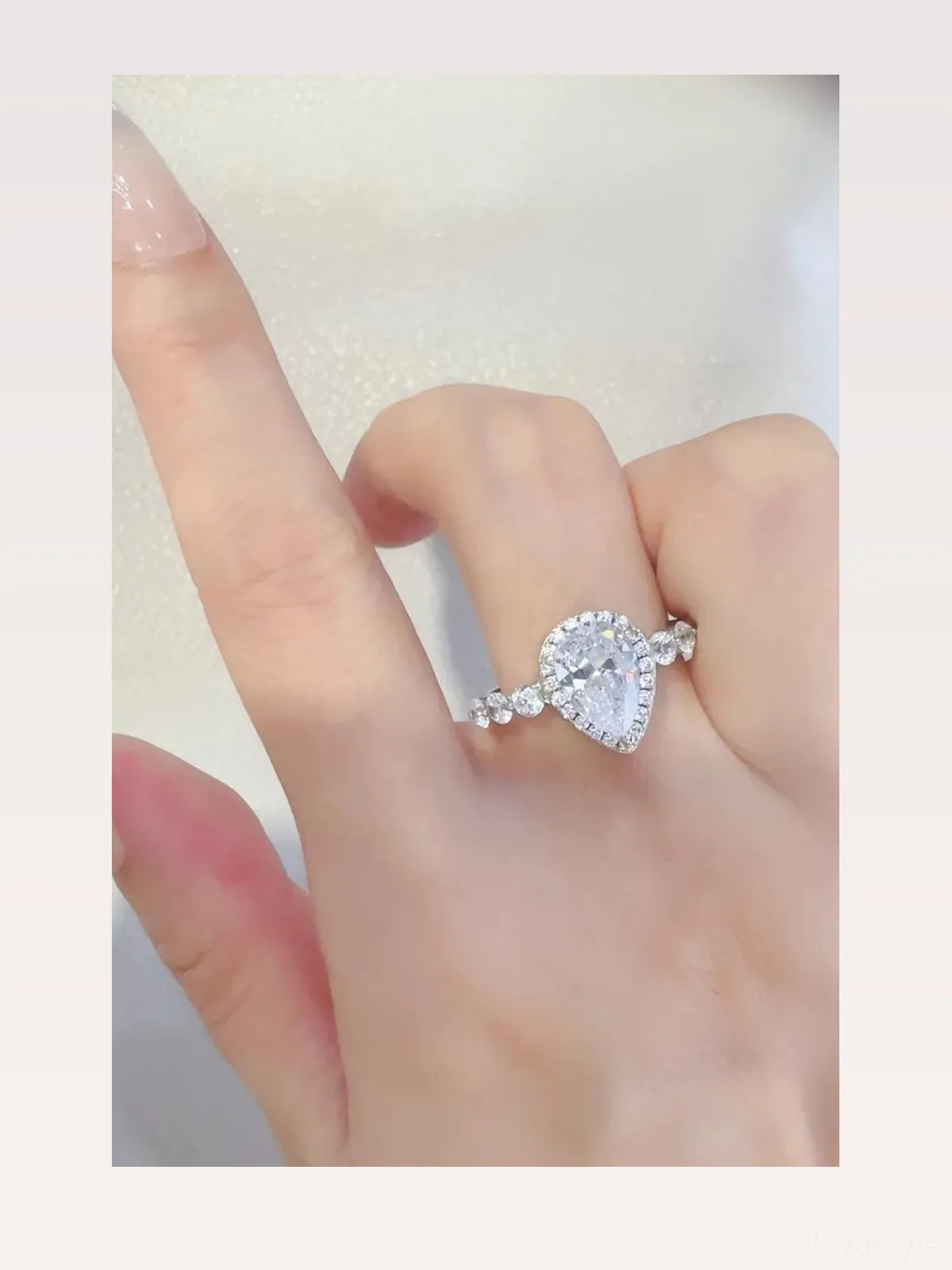 2 Carat Moissanite 925 Sterling Silver Ring — Pear-Shape Hal — styled showcase — Livostyle