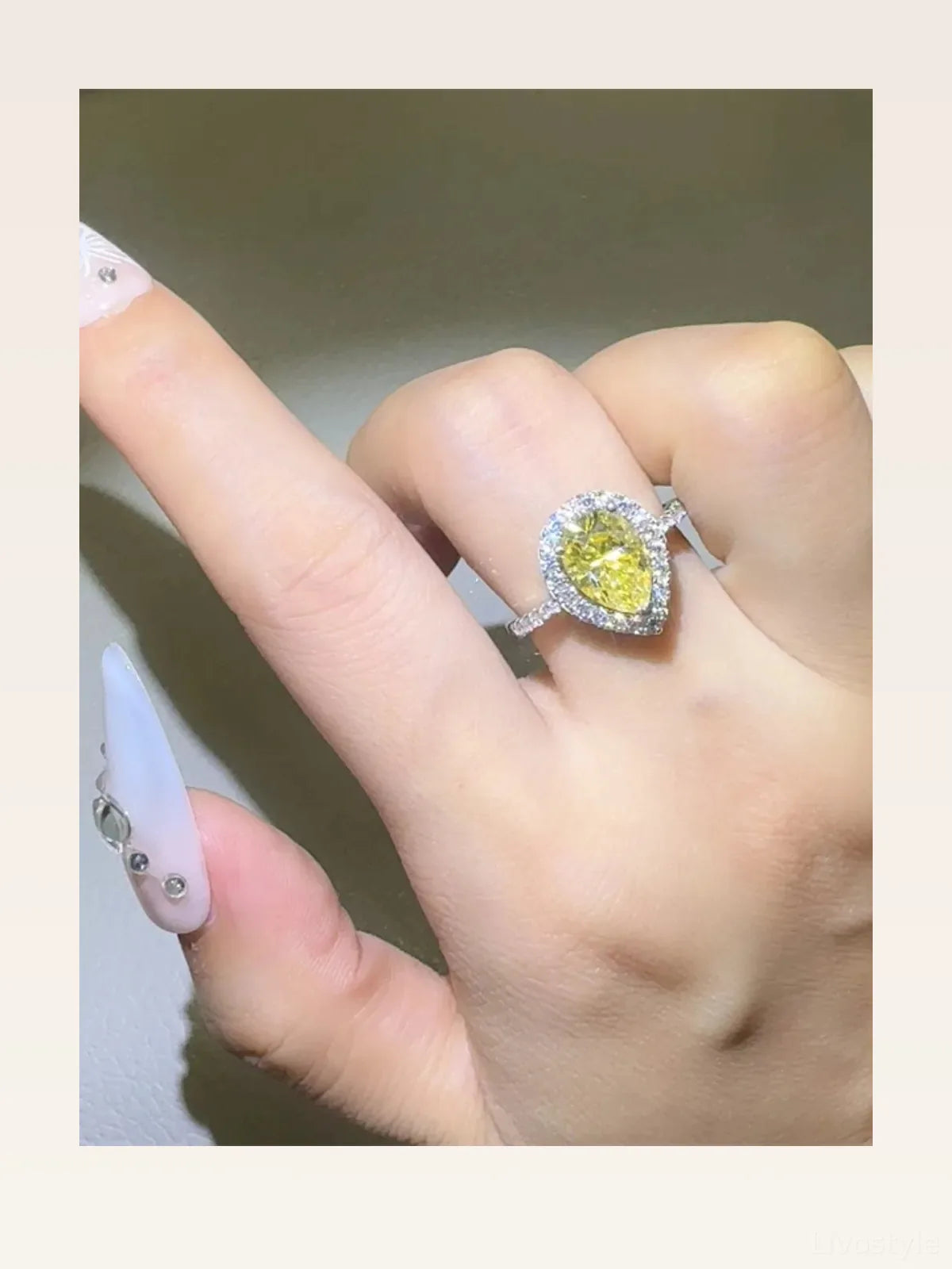2 Carat Moissanite 925 Sterling Silver Teardrop Shape Ring — styled showcase — Livostyle