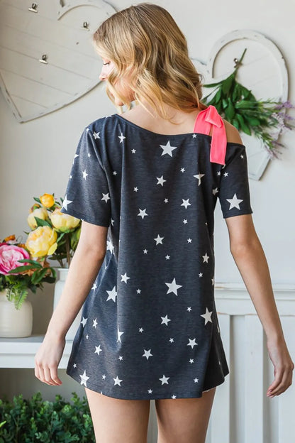 Full Size Star Print Asymmetrical Neck Short Sleeve Top detail — Livostyle