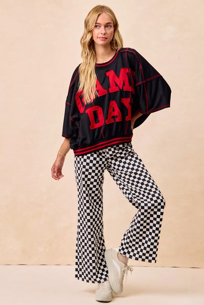Gameday Theme Checkered Printed Pants closeup — Livostyle