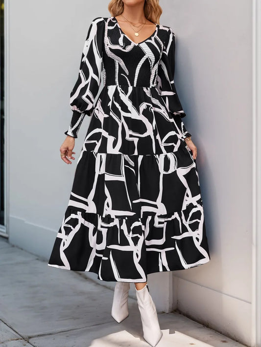Smocked Printed Long Sleeve Midi Dress in Black