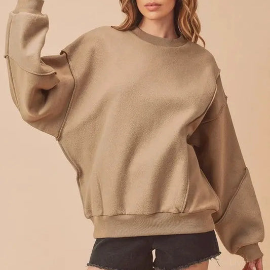 Trendy Exposed Seam Drop Shoulder Sweatshirt — square view — Livostyle