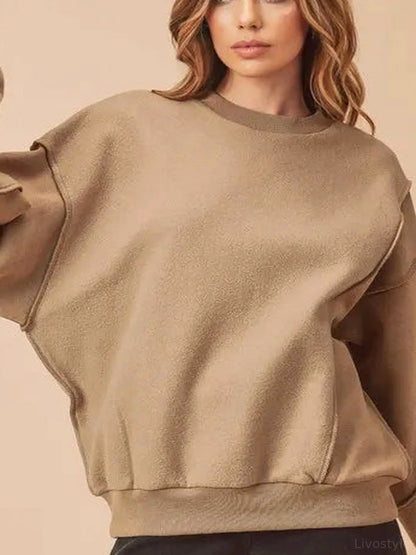 Trendy Exposed Seam Drop Shoulder Sweatshirt — detail view — Livostyle