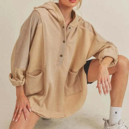 Chic Oversized Hoodie with Unique Slit & Snap Design — square view — Livostyle