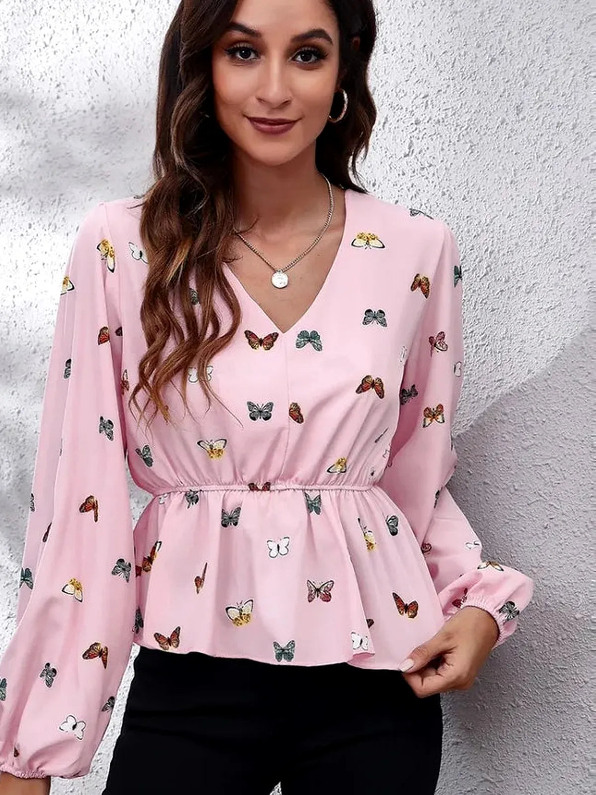 Chic Butterfly Peplum Blouse with Balloon Sleeves — detail view — Livostyle