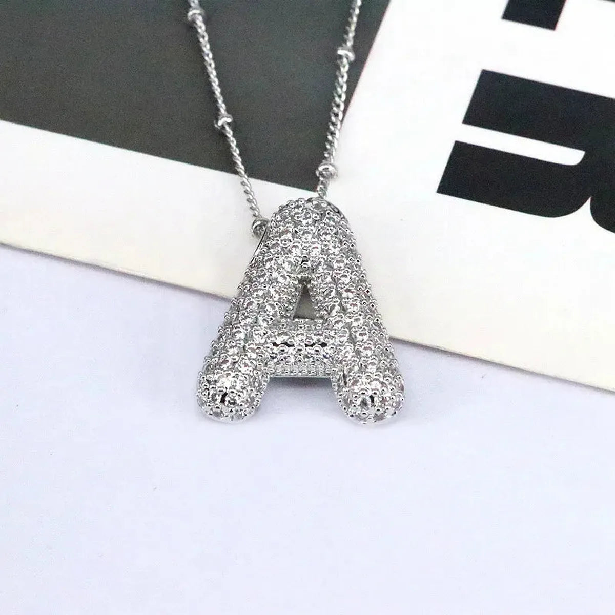 Copper Inlaid Zircon Letter A Pendant Necklace — square view — Livostyle