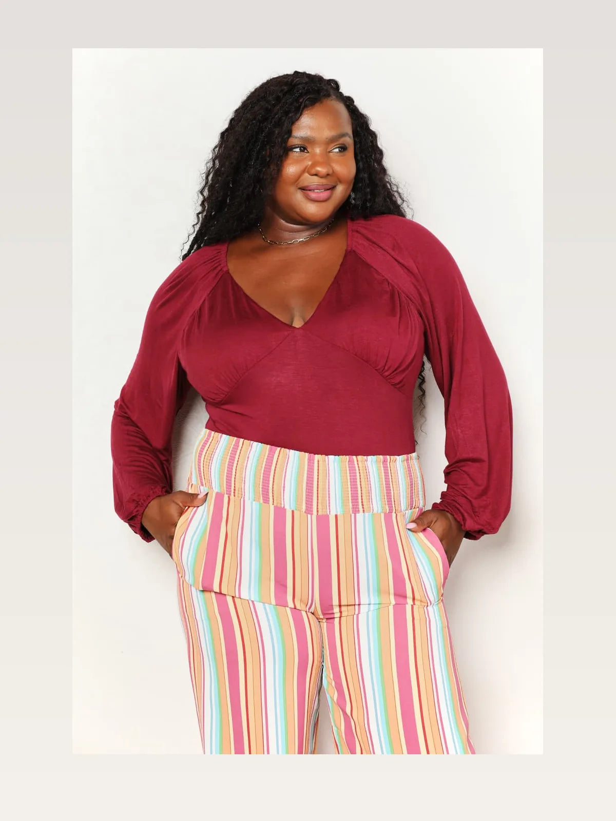 Sophisticated V-Neck Bodysuit with Poet Sleeves — styled showcase — Livostyle
