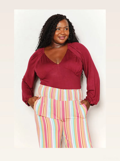 Sophisticated V-Neck Bodysuit with Poet Sleeves — styled showcase — Livostyle