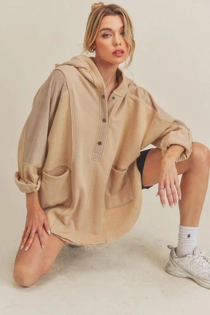 Chic Oversized Hoodie with Unique Slit & Snap Design — Livostyle
