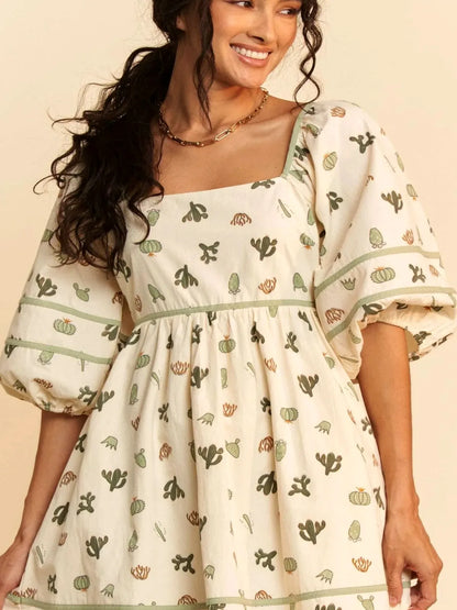 Whimsical Cactus Print Mini Dress with Contrast Piping — detail view — Livostyle