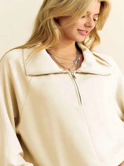 Half-Zip Raglan Sweatshirt with Adjustable Drawstring Hem — detail view — Livostyle
