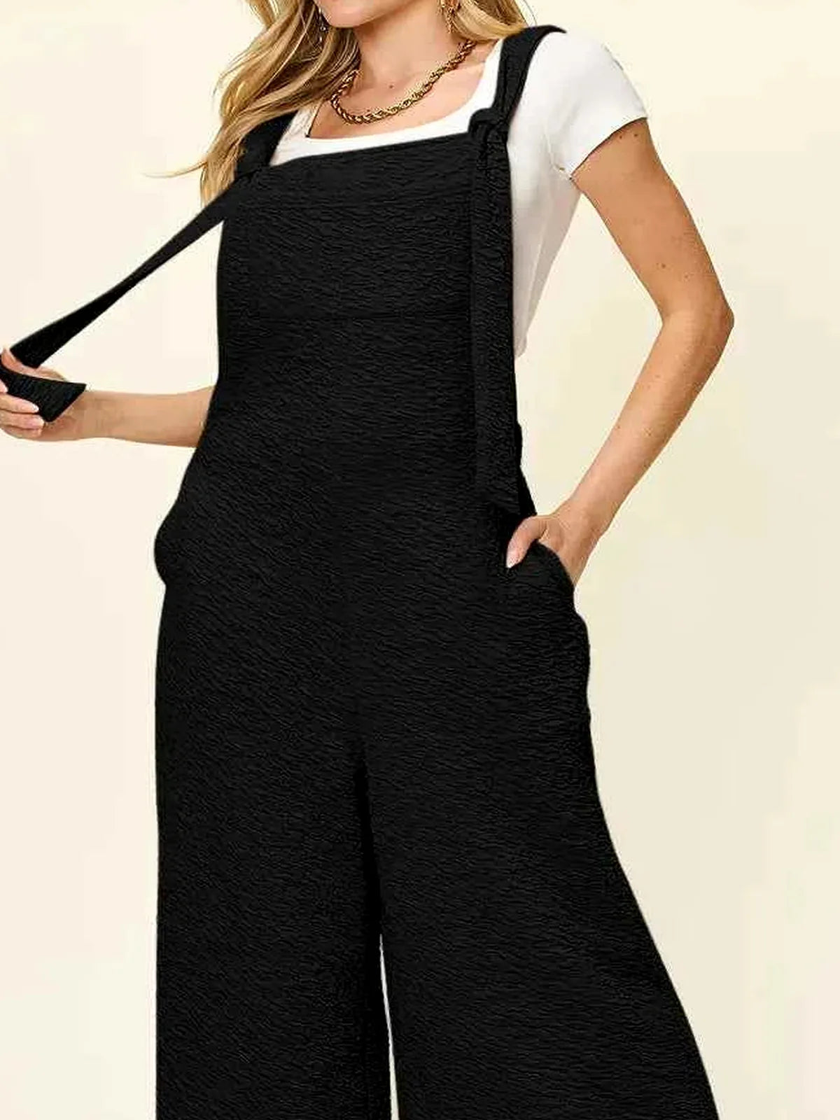 Sleeveless Wide Leg Jumpsuit — detail view — Livostyle