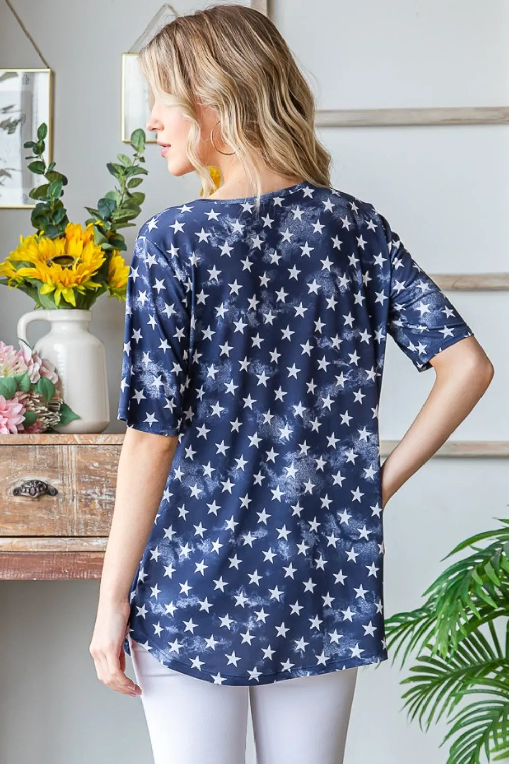 Full Size Short Sleeve Crisscross Star Babydoll Top detail — Livostyle
