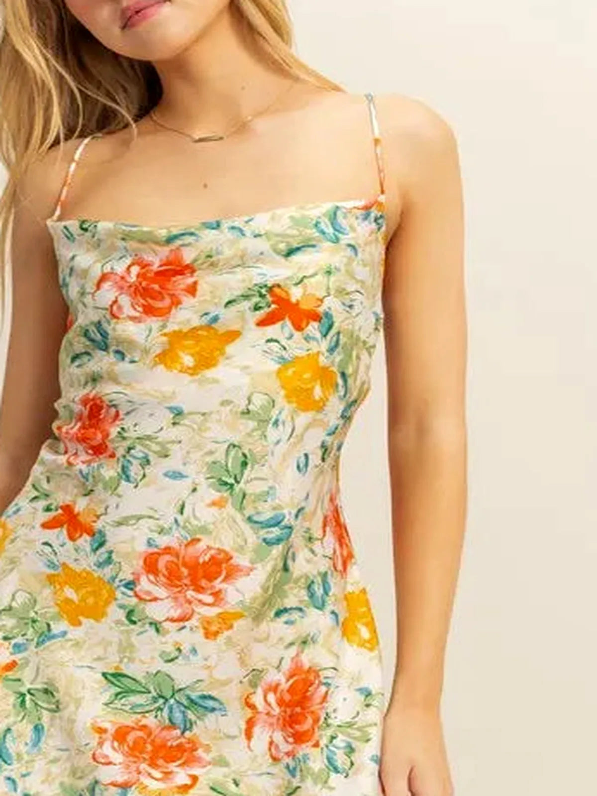 Chic Satin Mini Dress with Floral Print and Cowl Neck — detail view — Livostyle