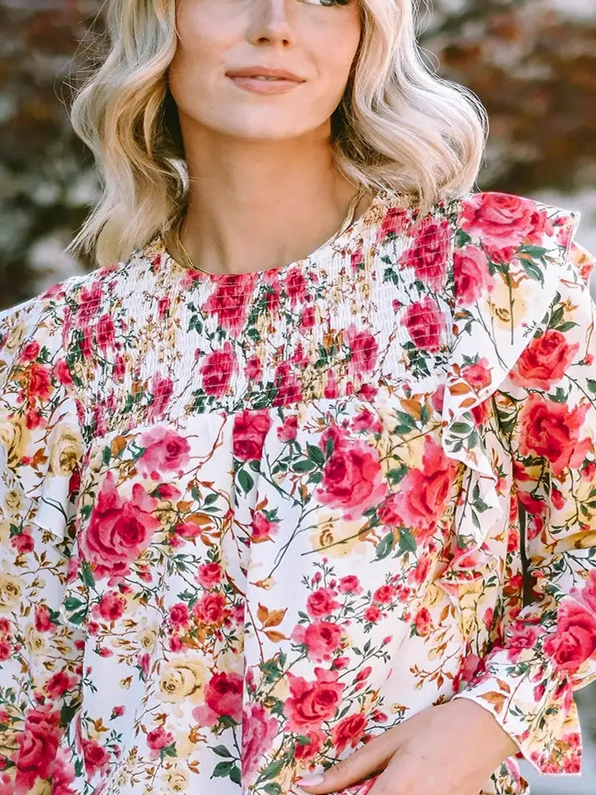 Chic Floral Print Smocked Blouse with Round Neckline — detail view — Livostyle