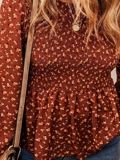 Elegant Floral Long Sleeve Blouse with Smocked Ruffled Hem — detail view — Livostyle