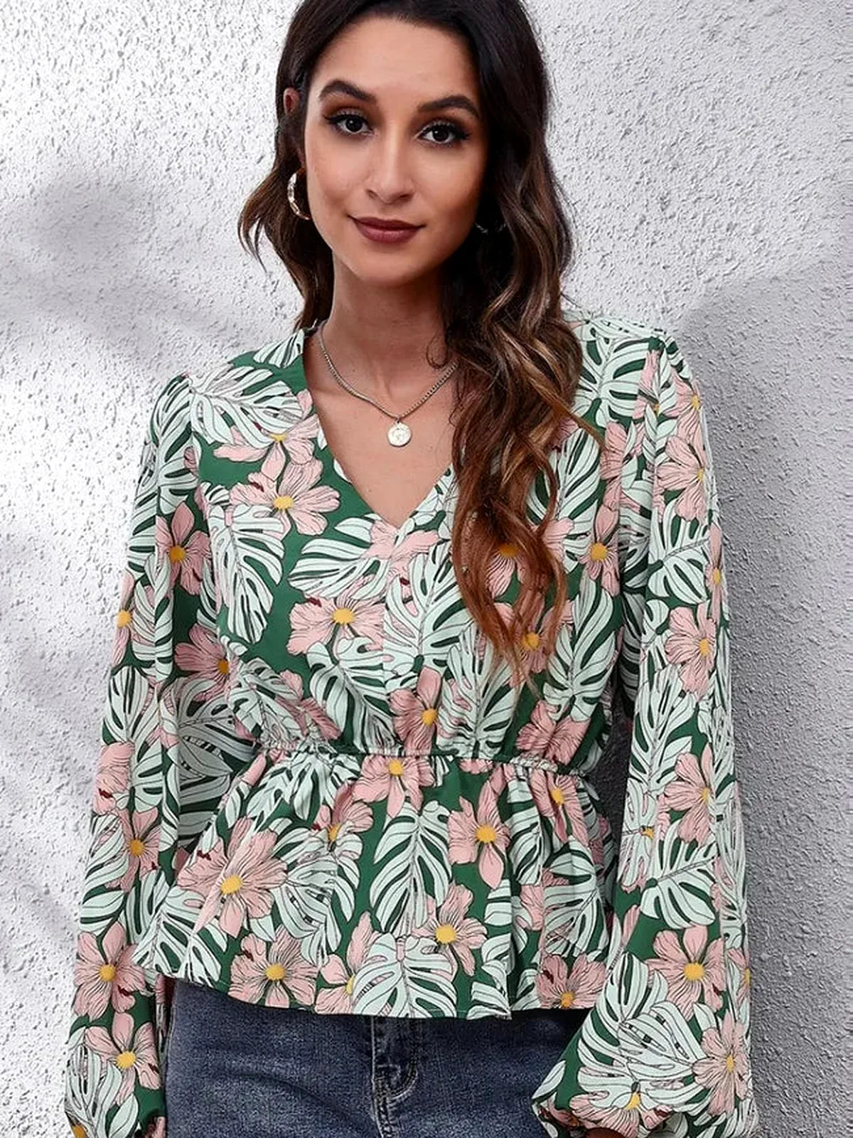 Chic Floral Peplum Blouse with Balloon Sleeves & V-Neck — detail view — Livostyle