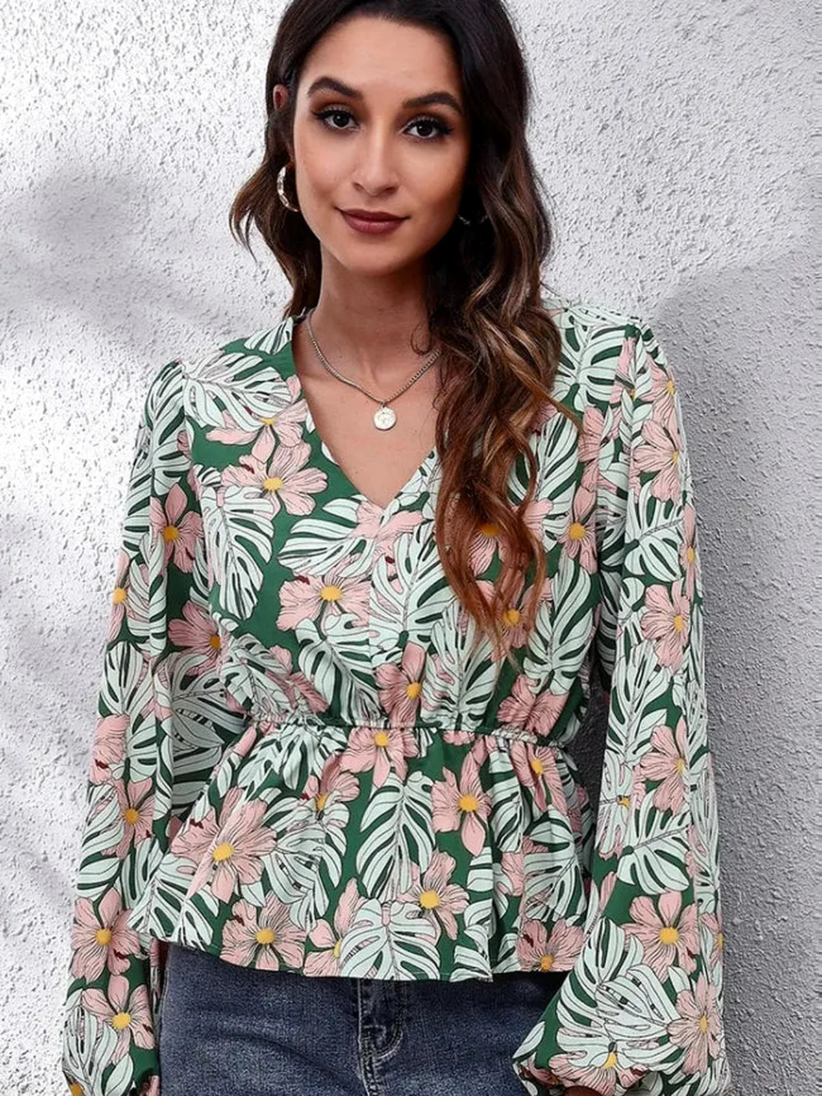 Chic Floral Peplum Blouse with Balloon Sleeves & V-Neck — detail view — Livostyle