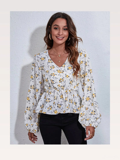 Chic Floral Peplum Blouse with Balloon Sleeves — styled showcase — Livostyle