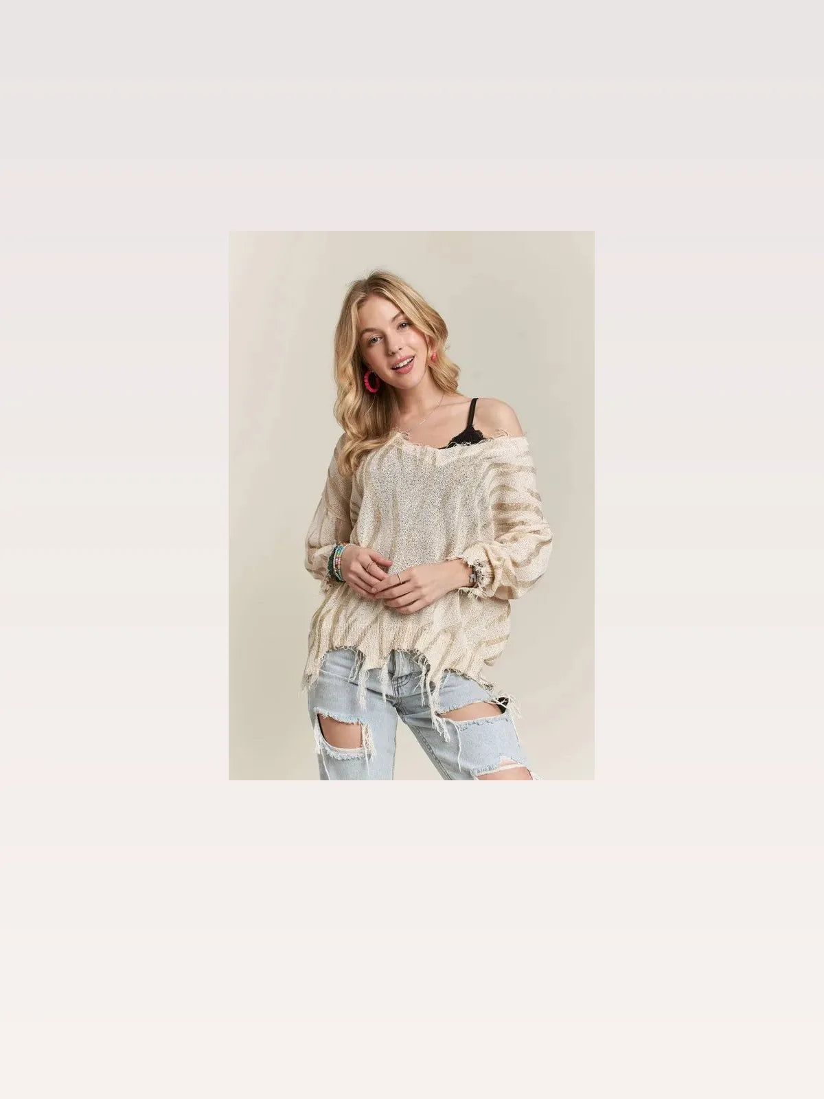 Edgy Zebra Print Knit Top with Frayed Detailing — styled showcase — Livostyle