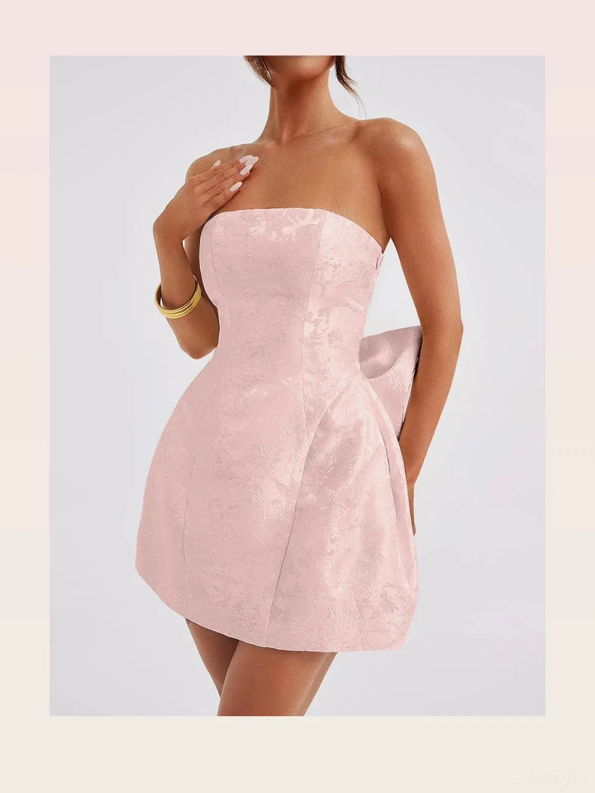 Elegant Sleeveless Satin Mini Dress with Lace-Up and Bow Det — styled showcase — Livostyle
