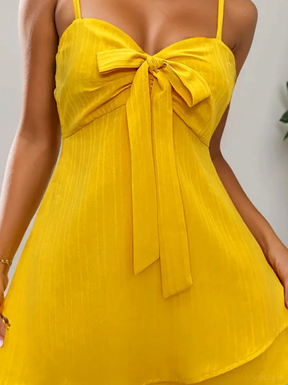 Chic Sweetheart Neck Mini Dress with Bow Detail — detail view — Livostyle