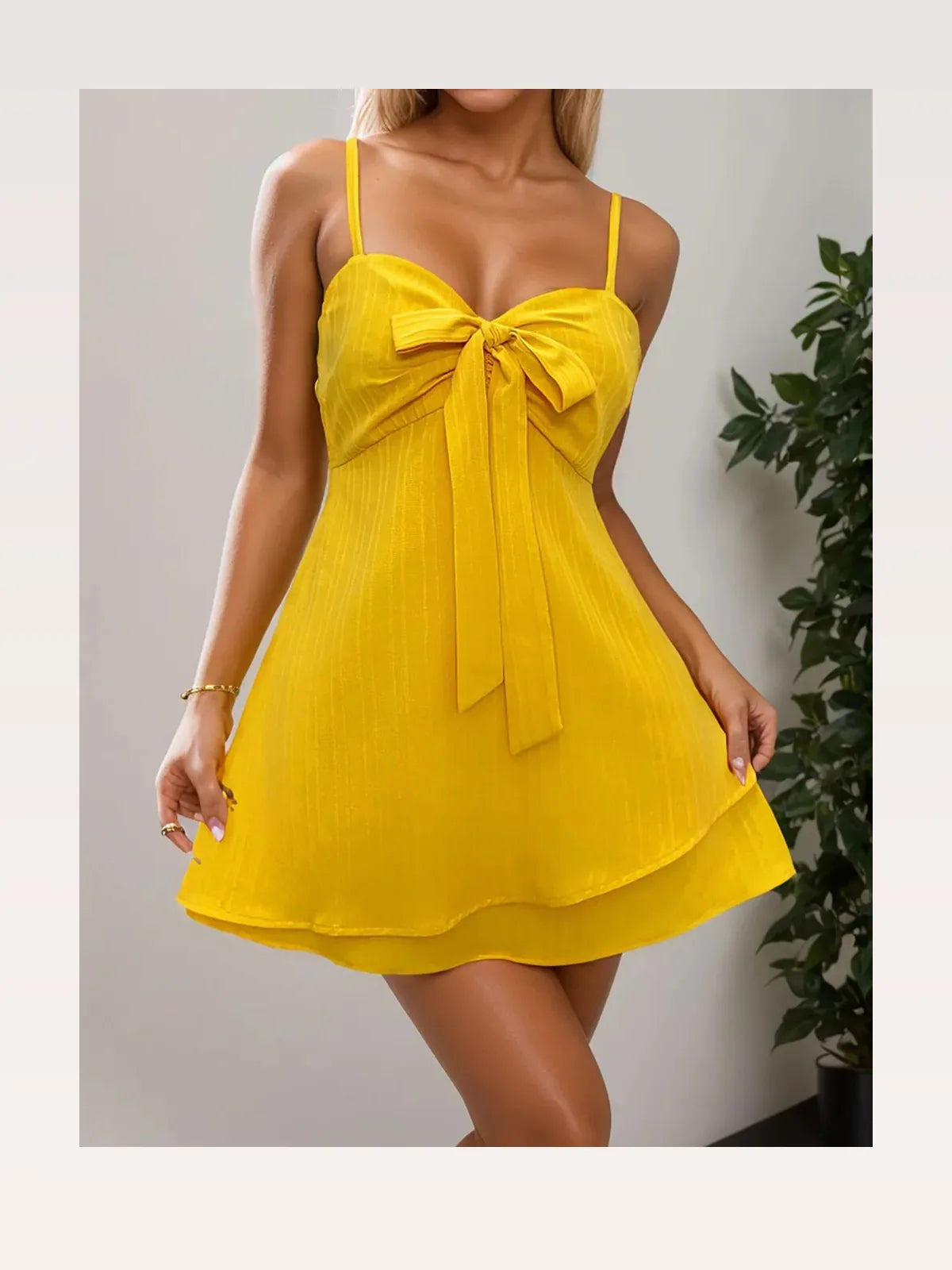 Chic Sweetheart Neck Mini Dress with Bow Detail — styled showcase — Livostyle