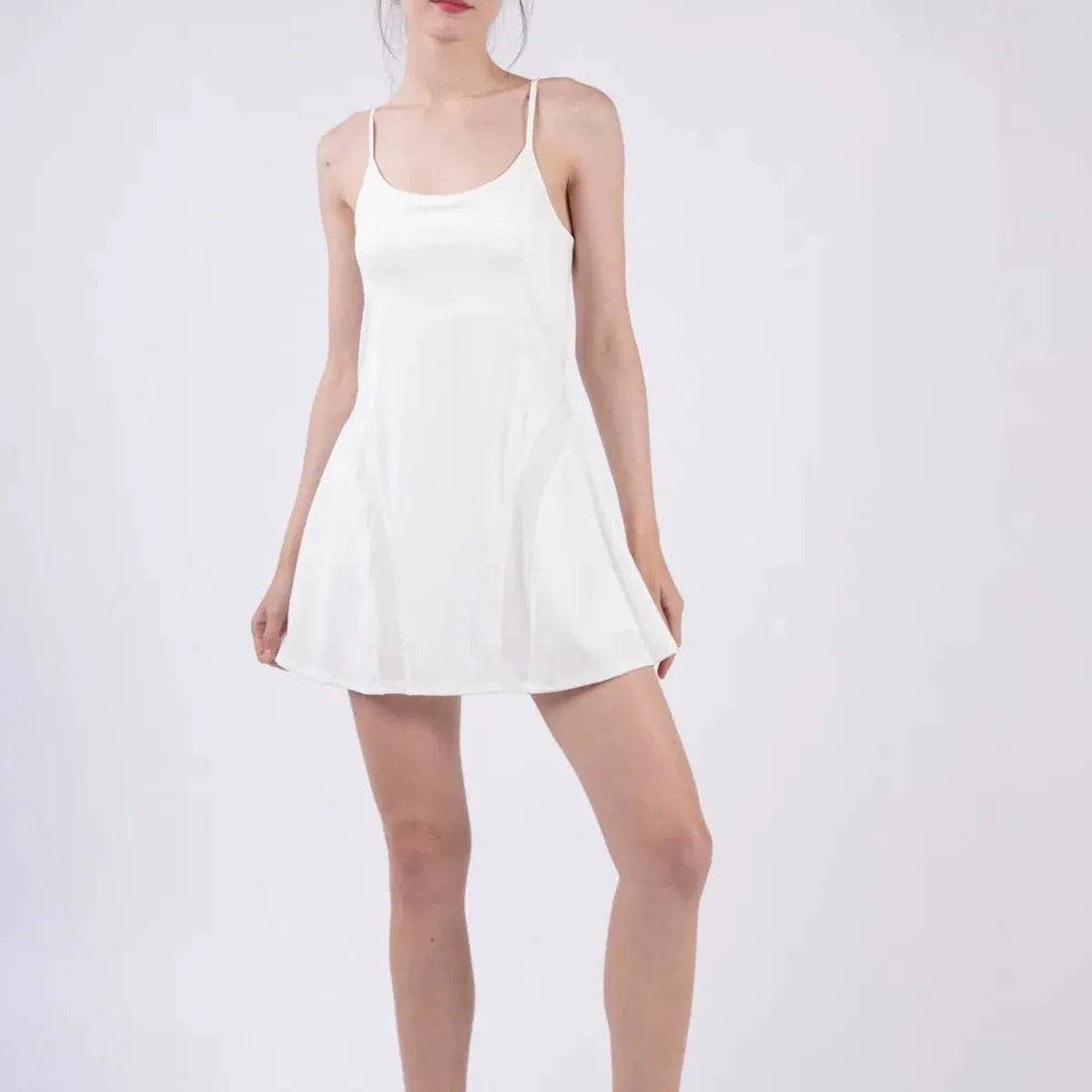 Mesh Detail Tennis Mini Active Dress with Shorts Inside in W — square view — Livostyle