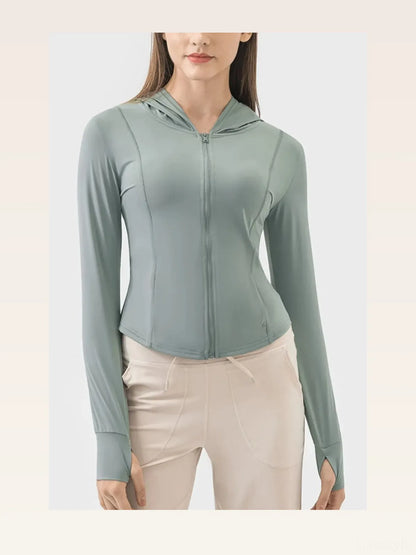 Pocketed Zip Up Hooded Long Sleeve Active Outerwear — styled showcase — Livostyle