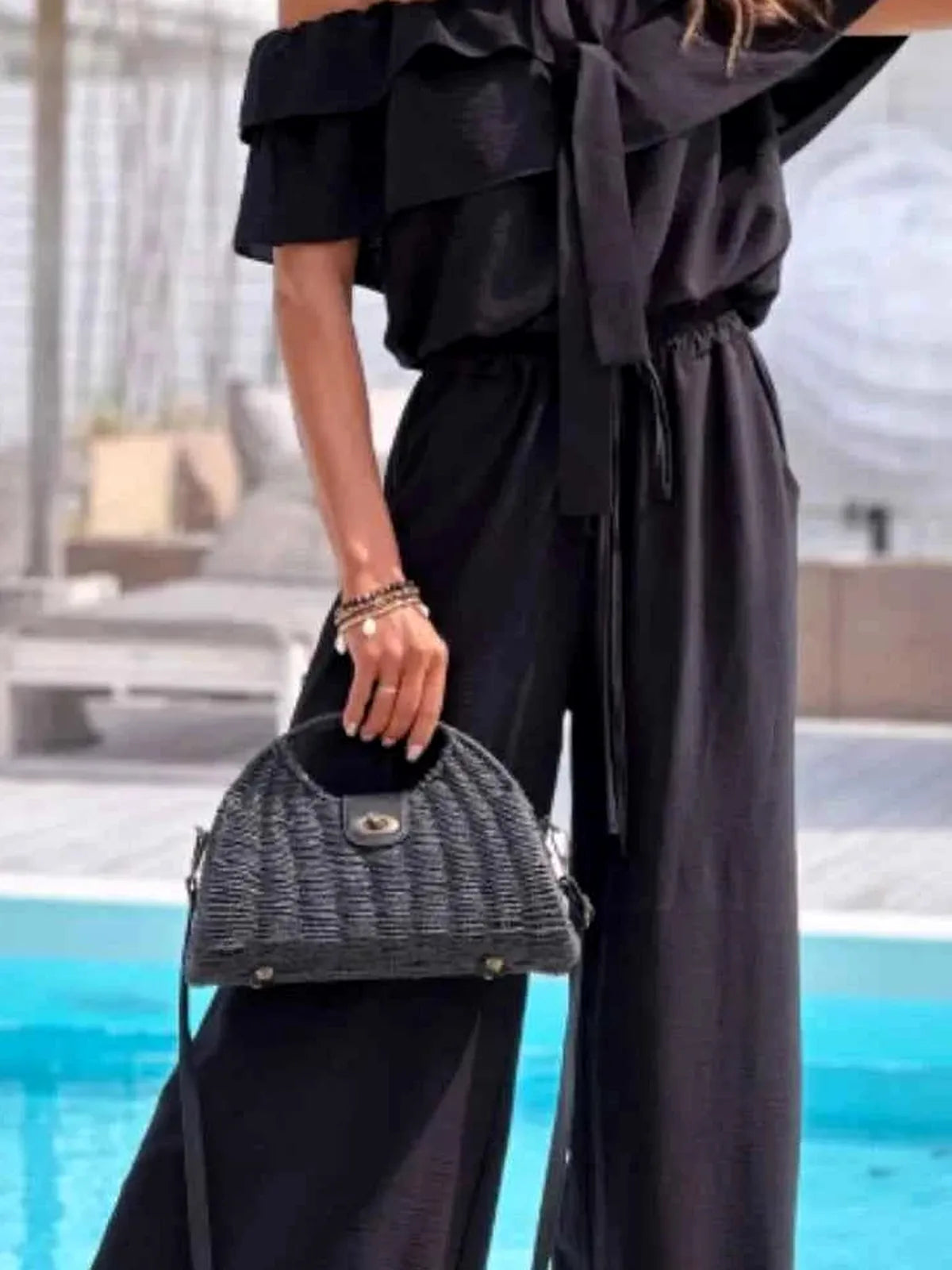 Off-Shoulder Ruffled Wide Leg Jumpsuit — detail view — Livostyle