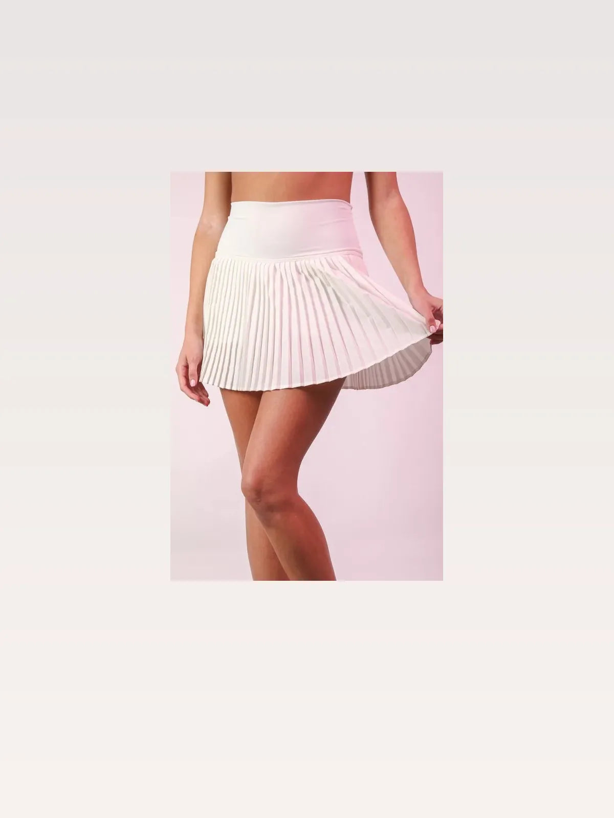Pleated Activewear Skirt with Shorts Inside in White — styled showcase — Livostyle