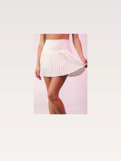 Pleated Activewear Skirt with Shorts Inside in White — styled showcase — Livostyle