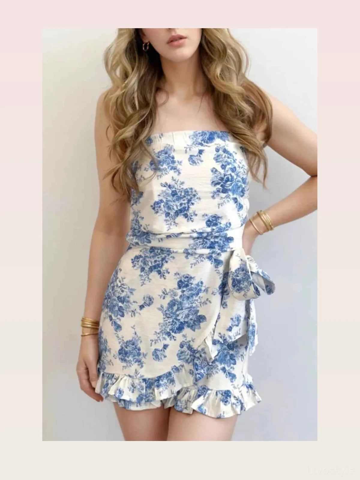 Printed Strapless Ruffle Hem Wrap Romper — styled showcase — Livostyle