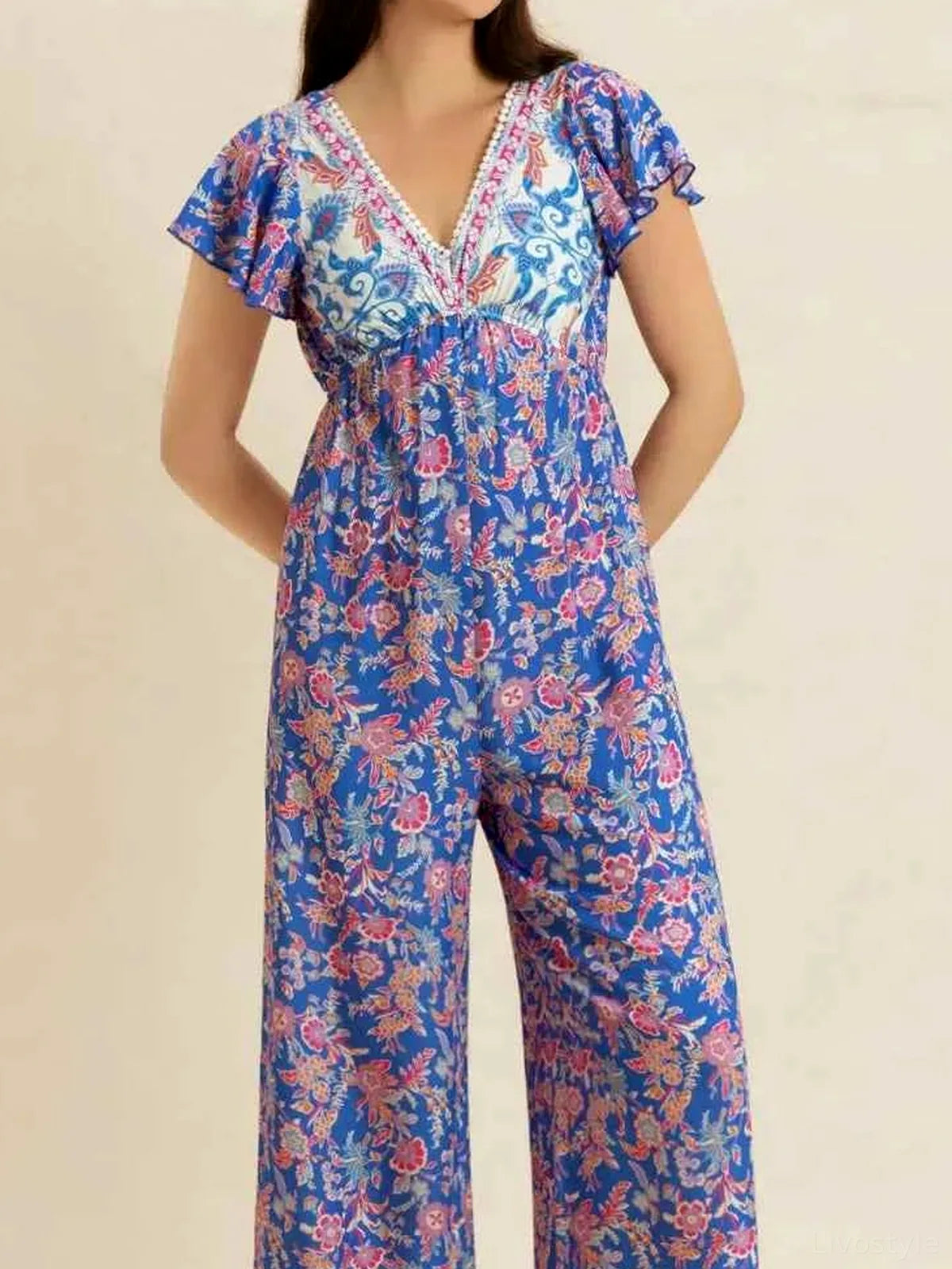 Blue Floral Print V-Neck Short Sleeve Wide Leg Jumpsuit — detail view — Livostyle