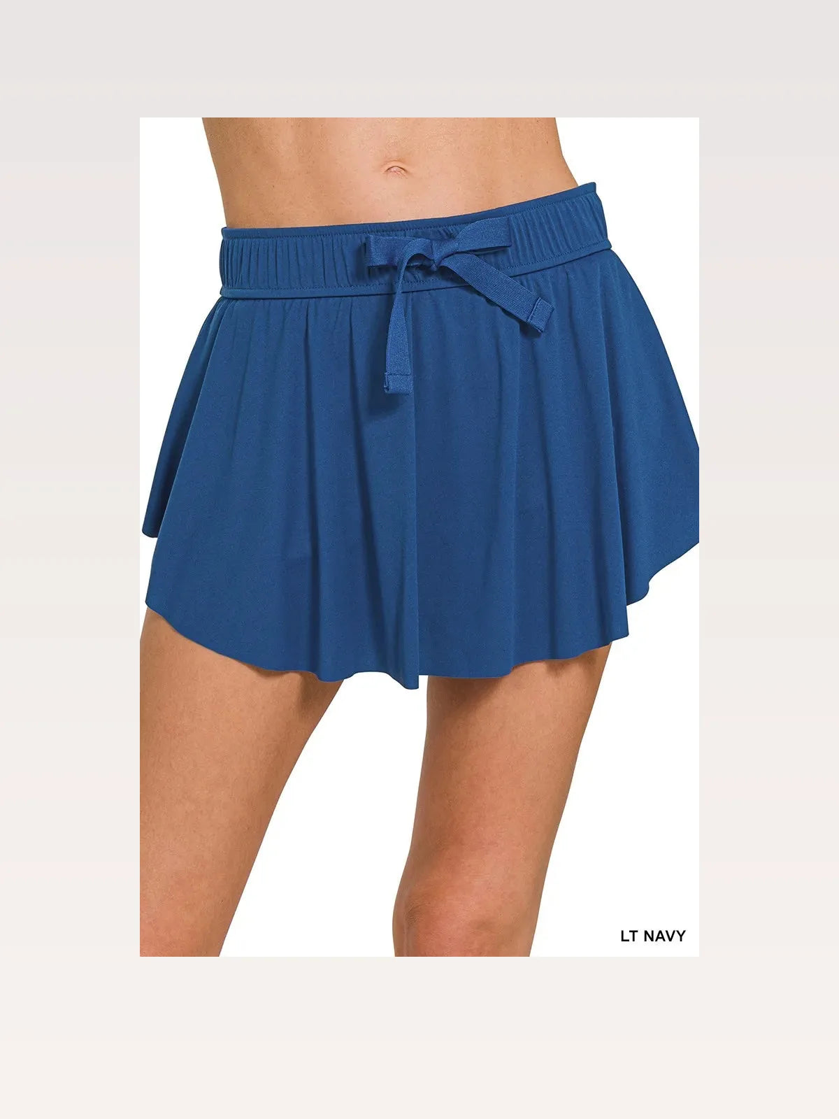 Ruffle Hem Tennis Skirt With Hidden Inner Pockets in LT NAVY — styled showcase — Livostyle