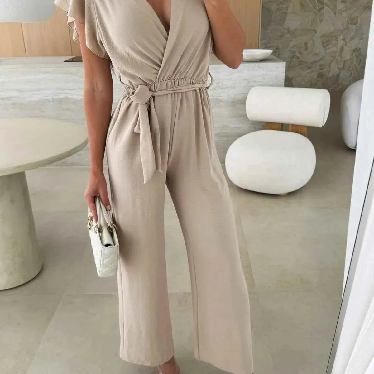 Surplice Wide Leg Belted Jumpsuit — square view — Livostyle