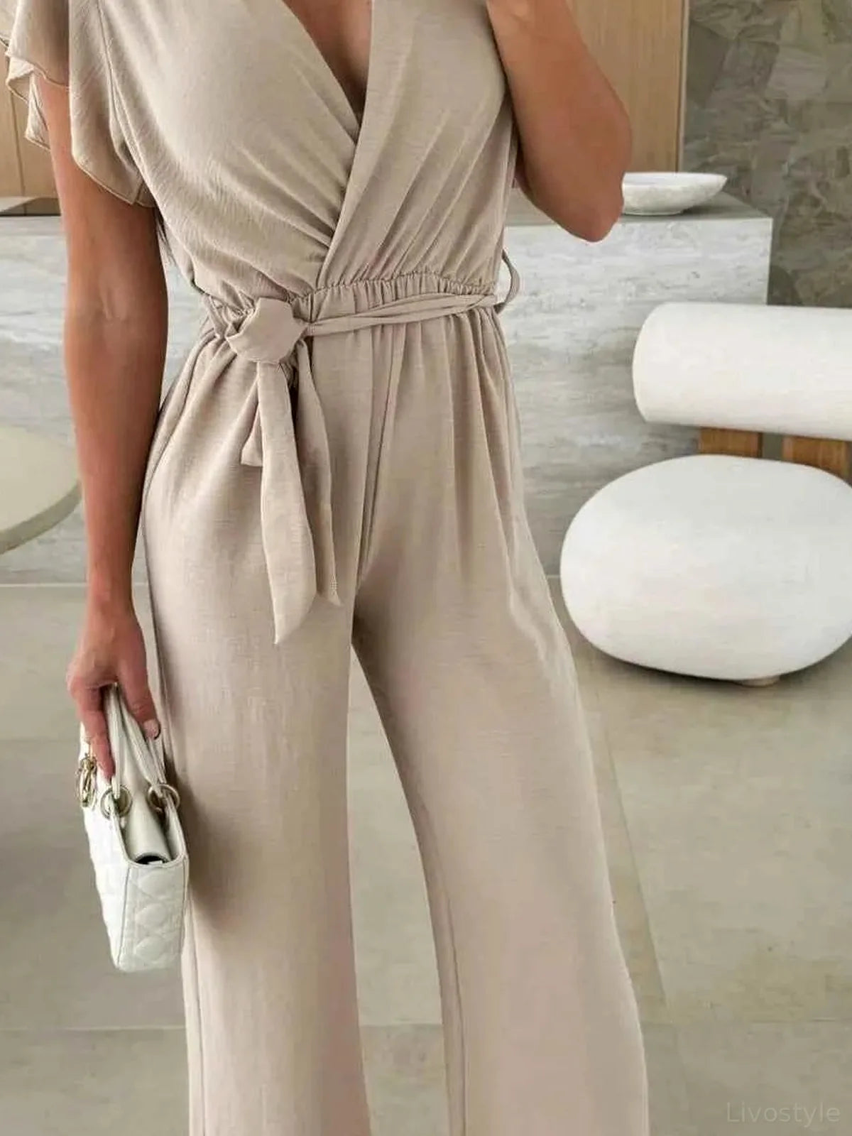 Surplice Wide Leg Belted Jumpsuit — detail view — Livostyle