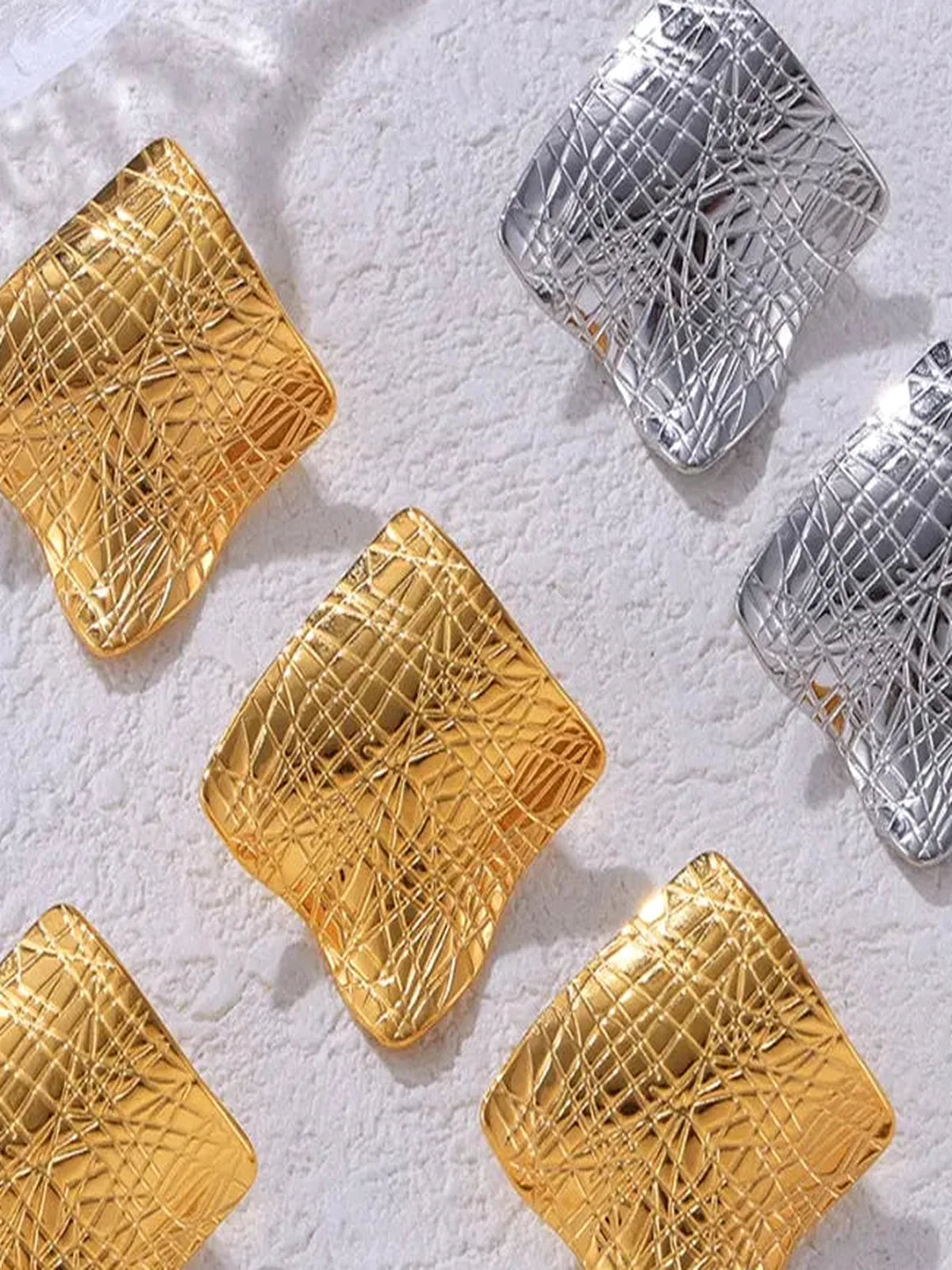 Textured Titanium Steel Stud Earrings — detail view — Livostyle