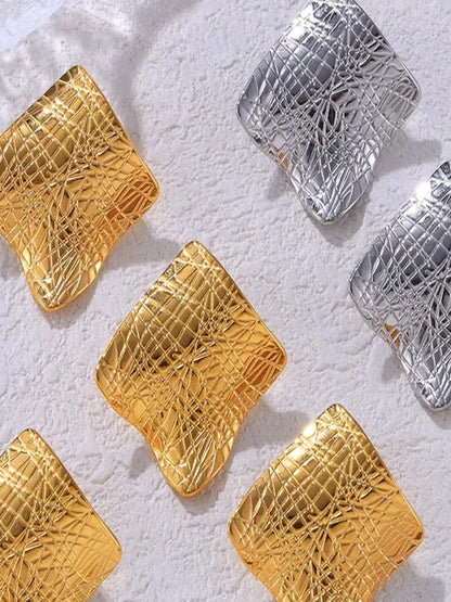 Textured Titanium Steel Stud Earrings — detail view — Livostyle