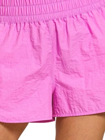 Windbreaker Smocked Waistband Running Shorts in BRIGHT MAUVE — detail view — Livostyle