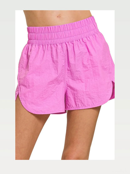 Windbreaker Smocked Waistband Running Shorts in BRIGHT MAUVE — styled showcase — Livostyle